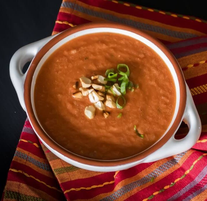 Peanut tomato soup on a colourful napkin