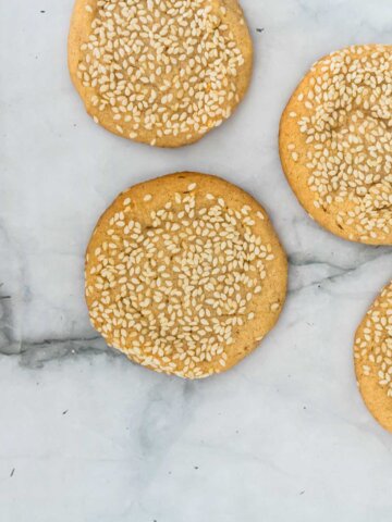 sesame butter cookies on a marble counter top